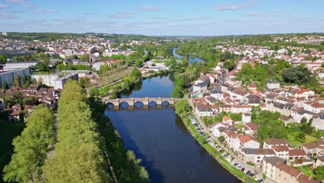 Pedestrian-old-bridge-of-Saint-Etienne-on-Vienne-River,-Limoges-cityscape,-France