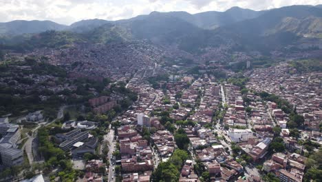 Aerial-panorama-view-over-dense-population-community-in-Medellin,-Colombia