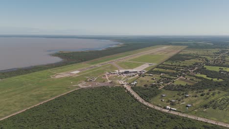 Panoramic-view-of-the-beautiful-Termas-de-Río-Hondo-International-Airport,-with-the-Río-Hondo-reservoir-in-the-background