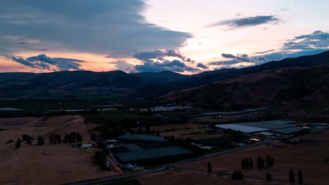 Colorful-hyperlapse-over-the-Charry-Orchards-in-Cromwell-in-New-Zealand-during-sunset