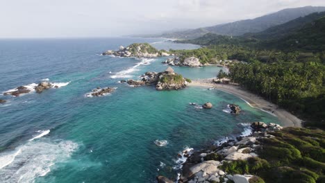 Aerial-orbiting-view-of-Famous-Cabo-San-Juan-beach-bay-in-Tayrona-National-Natural-Park,-Colombia