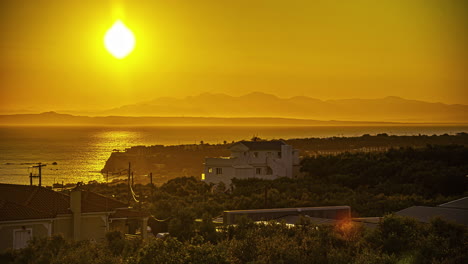 Golden-sunrise-timelapse-above-shore-in-Greece,-Europe