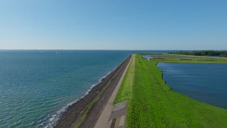 Drone-shot-of-dike-near-the-place-where-the-flooding-of-1953-happened-in-the-Netherlands