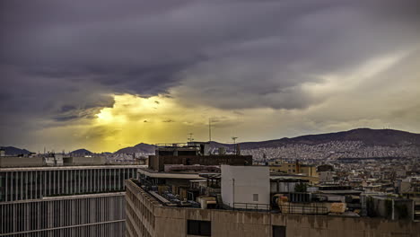 Timelapse-of-distant-view-on-Philopappos-Hill-over-rooftops-in-Athens,-Greece