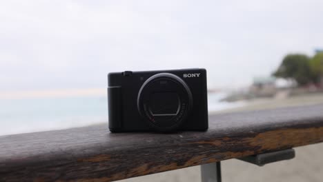 Close-up-of-Sony-Vlog-Camera-ZV-1-with-sea-in-background