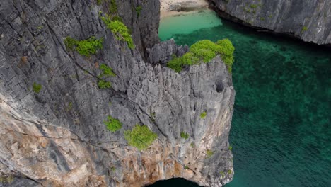 Drone-View-Private-Cove-Beach,-Ko-Phi-Phi-Le---Maya-Bay-Island-Cliffs--Krabi-Province-Thailand