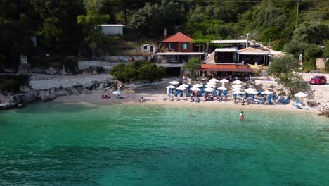 Orbit-View-over-Gorgeous-and-Cozy-Afteli-Beach-Seashore,-Lefkada,-Greece