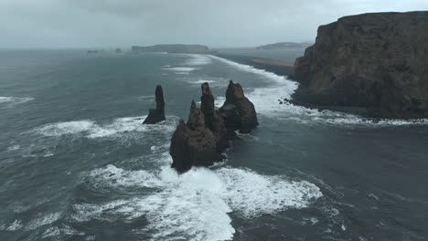 Reynisdrangar-seastacks-in-Iceland-at-the-black-beach-close-to-Vik