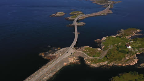 Aerial-tilt-shot-of-the-Atlantic-ocean-road,-Atlanterhavsveien,-summer-in-Norway