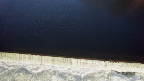 Low-drone-flight-over-the-Pawtucket-dam