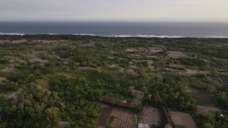 aerial-view-of-coastline-with-tropical-climate-at-sunset,-yogyakarta-south-coast