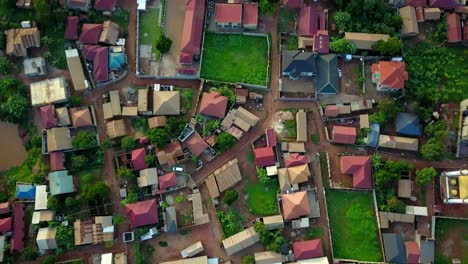 Above-View-Of-Residential-Neighbourhood-Near-Kampala-Entebbe-Expressway-In-Uganda,-East-Africa