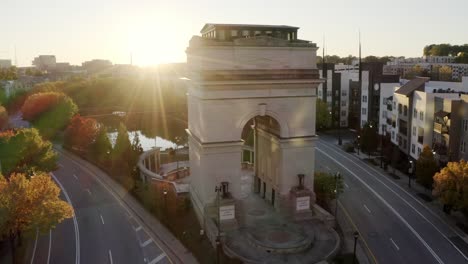 Aerial-of-Historical-Art-Museum-Millennium-Gate-Museum-triumphal-arch-structure-at-sunset,-Atlanta,-Georgia,-USA