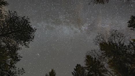 A-timelapse-of-the-magnificent-night-sky-with-a-Milky-Way-and-passing-clouds
