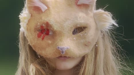 Girl-with-cat-mask-in-slow-motion-close-up