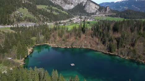 Aerial-view-of-a-vibrant-lake-in-Bad-Ragaz,-St