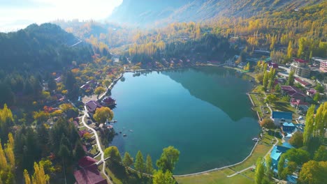 Pan-aerial-shot-of-Lower-Kachura-Lake,-Shangrila-Lake-in-Skardu,-Pakistan-during-afternoon