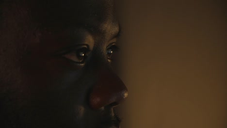 Close-Up-Of-Black-Male-Eyes-Looking-At-Computer-Screen