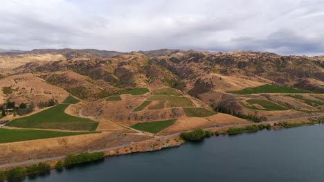 Panoramic-aerial-view-of-the-mountains-and-shores-of-Lake-Dunstan-in-New-Zealand