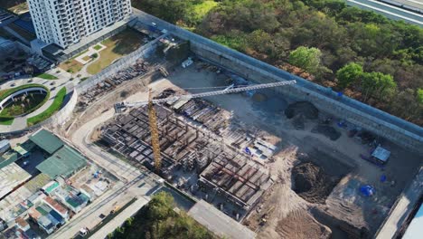 Building-Construction-And-Crane-In-The-City---Aerial-Drone-Shot