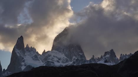 Dramatic-timelapse-of-clouds-swirling-around-the-peaks-of-Fitz-Roy-at-sunset