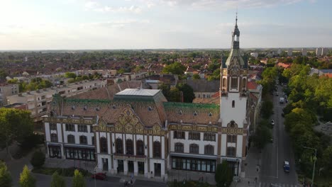 Ornate-tower-of-City-Hall,-city-of-Felegyhaza,-Hungary,-aerial-view