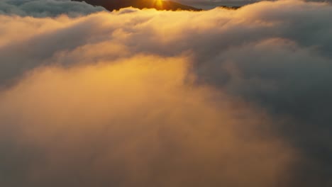 Drone-flight-over-the-clouds-during-a-sunrise-in-Madeira-Portugal