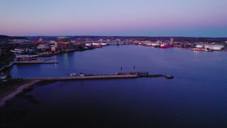 Aerial-View-of-Long-Island-Sound-Featuring-Q-Bridge-and-Tomlinson-Bridge-at-Sunset-in-New-Haven,-Connecticut