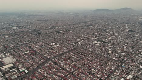 Drone-captures-aerial-perspectives-of-Mexico-City-Metropolitan-Region,-Ecatepec