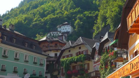 Young-Man-Walks-in-a-Balcon-of-one-of-the-Hallstatt-Village-Houses