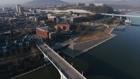 Aerial-footage-panning-over-the-Market-Street-bridge-and-the-Tennessee-Aquarium-in-the-early-morning-light