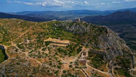 Acrocorinth-castle-saulestari-on-tall-cliff-with-sweeping-view-of-valley,-aerial