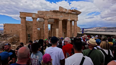 Crowding-Tourists-Visiting-The-Monument-of-Agrippa-Historical-Landmark-In-Athens,-Greece