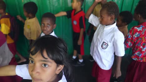 Children-in-Papuan-village-school,-mixed-Asian-native-community