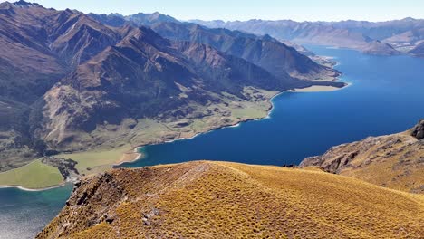 Beautiful-natural-landscape,-drone-panorama-of-Lake-Hawea-and-New-Zealand-mountain-scenery