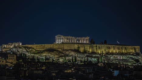 Time-lapse-of-the-cityscape-and-the-illuminated-Parthenon,-night-in-Athens,-Greece