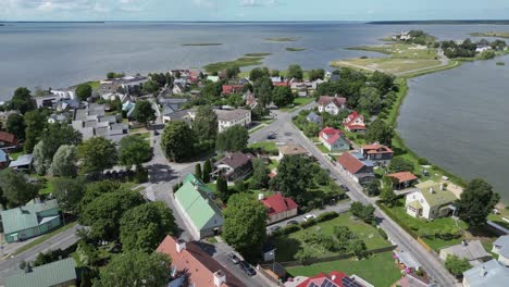 Aerial-rotates-above-Baltic-Sea-shoreline-of-Haapsalu-city-in-Estonia
