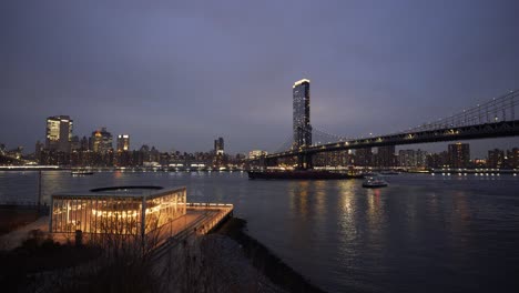 Manhattan-skyline-at-night-with-carousel-lit-up