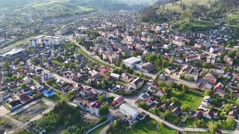 Aerial-drone-footage-reveals-sunny-Gura-Humorului,-Romania