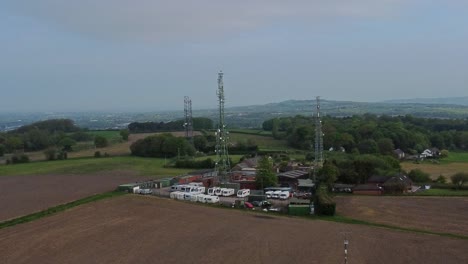 Billinge-hill-transmitter-antenna-towers-circling-aerial-view-caravan-storage-on-top-of-Crank-landmark-overlooking-St-Helens-countryside