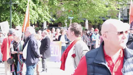 Activists-rallying-for-workers'-rights-in-sunny-urban-park