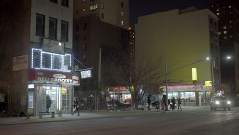 Corner-Delis-and-Liquor-Store-at-Night-in-East-Harlem-New-York-City