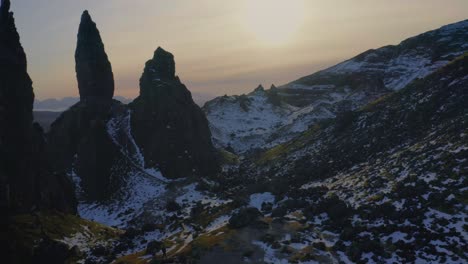 Establishing-backward-aerial-of-The-Old-Man-of-Storr,-Isle-of-Skye,-Scotland