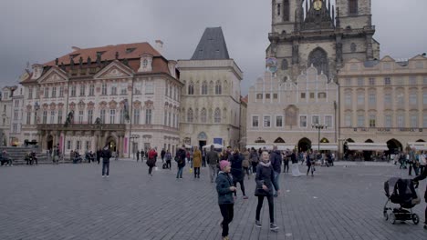 Bustling-scene-at-Prague's-Old-Town-Square-with-historic-architecture-and-a-floating-bubble