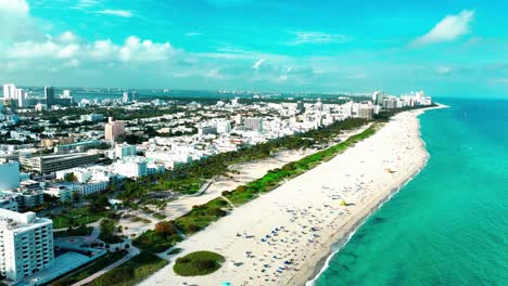 Miami-South-Beach-on-a-cloudy-day-at-dusk-aerial-view-pointed-down-at-the-sand-on-the-coast-of-the-Pacific-Ocean