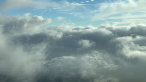 Pilot-POV-flying-across-a-sky-with-some-fluffy-clouds