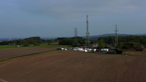 Billinge-hill-transmitter-antenna-towers-aerial-view-orbiting-caravan-storage-on-top-of-Crank-landmark-overlooking-St-Helens-countryside