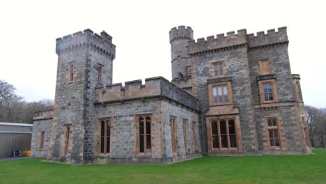 Exterior-facade-of-Lews-Castle-and-green-lawns-in-Stornoway,-Outer-Hebrides-of-Scotland-UK