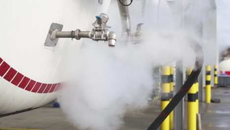 Massive-amount-of-steam-leaving-gas-tanker,-close-up-view