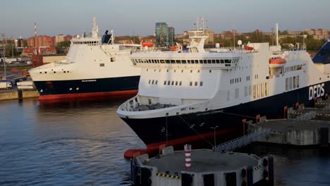Two-ferries-of-the-DFDS-company-are-moored-at-the-terminal-and-are-waiting-for-the-cargo-to-be-loaded-and-to-leave-the-port